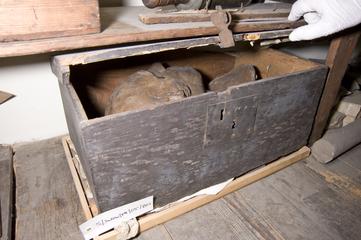 Wooden box containing bust of James Watt