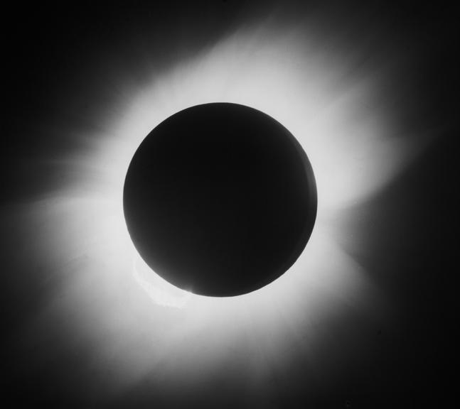 Glass positive photograph of total solar eclipse (black-and-white transparency; solar eclipse)