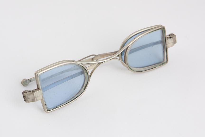 Turn pin spectacles, double lenses, inners tinted, silver frame