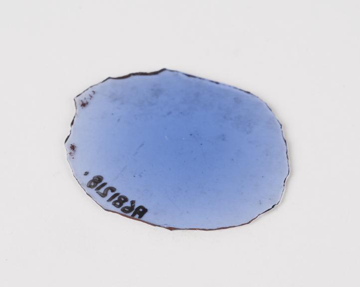 Lens, glass, roughly oval, roughly cut, tinted blue, European