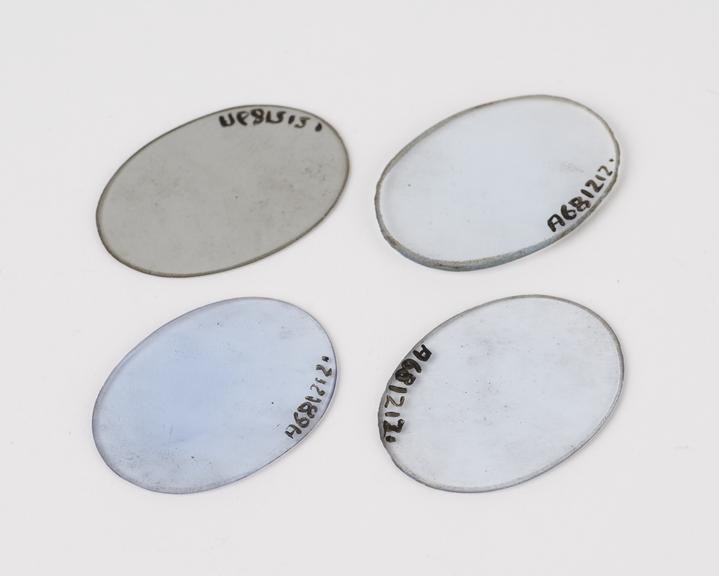 Four lenses, oval, glass, slightly convexed, light blue tint