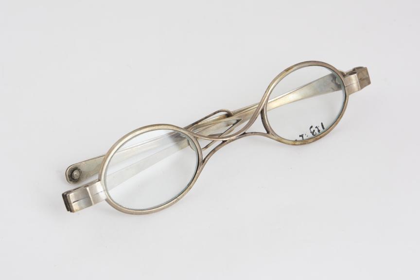 Turn pin spectacles, reversible, silver frames, signed JG