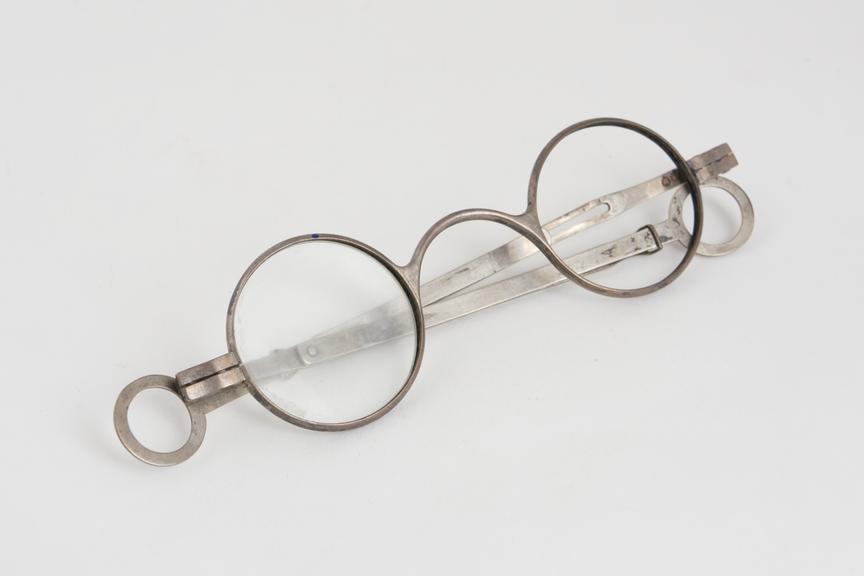 Extending spectacles, silver, left lens missing, marked J.C