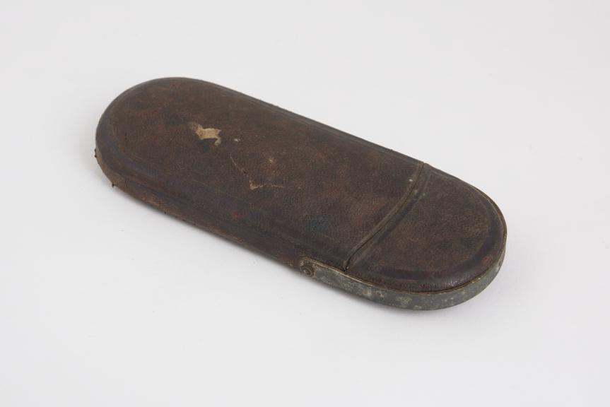 Frogmouth spectacle case, leather and metal, English, 1830-1900