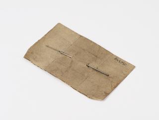 Lachrymal style attached to sheet of paper