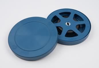 Film in blue metal container