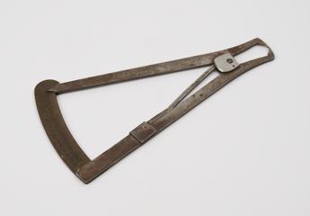 Spring loaded caliper with scale