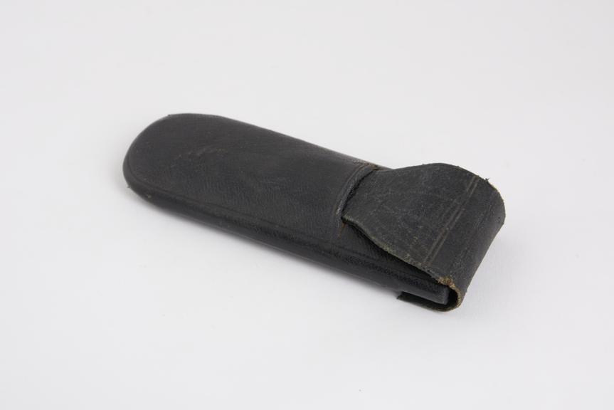 Tuck in, spectacle case of leather covered cord, English