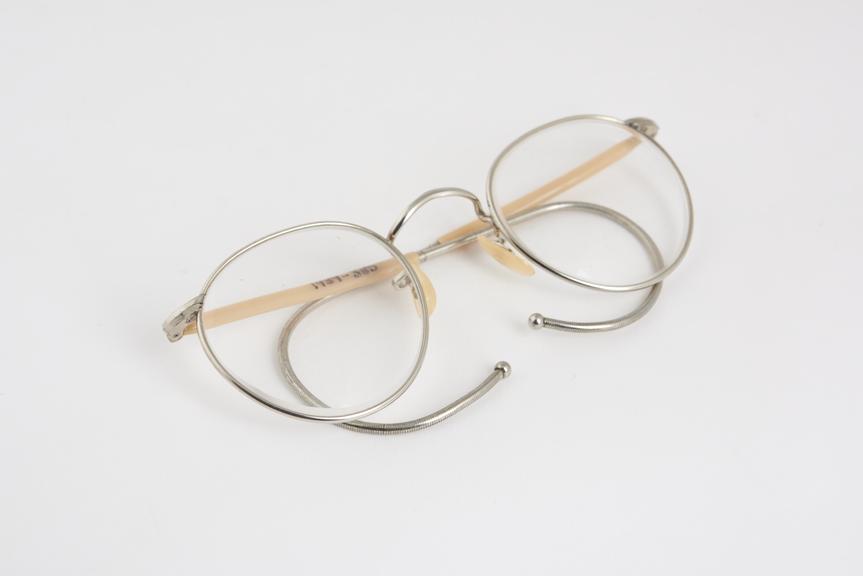 Pair of spectacles, nickel windsor frame, peach plastic