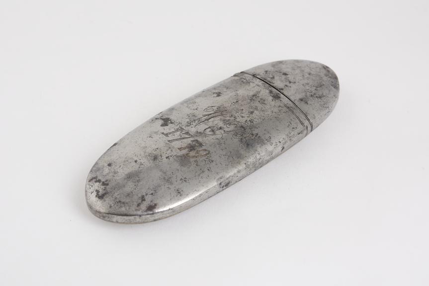 Spectacle case, hinged cap broken, steel, marked W.P
