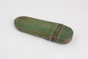 Hinged cap spectacle case