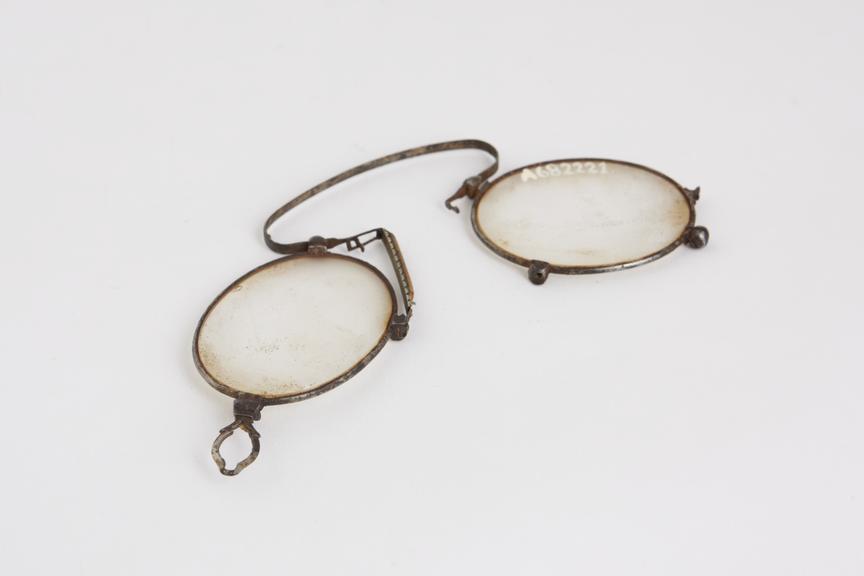 Pince nez, folding spectacles, metal and cork, English