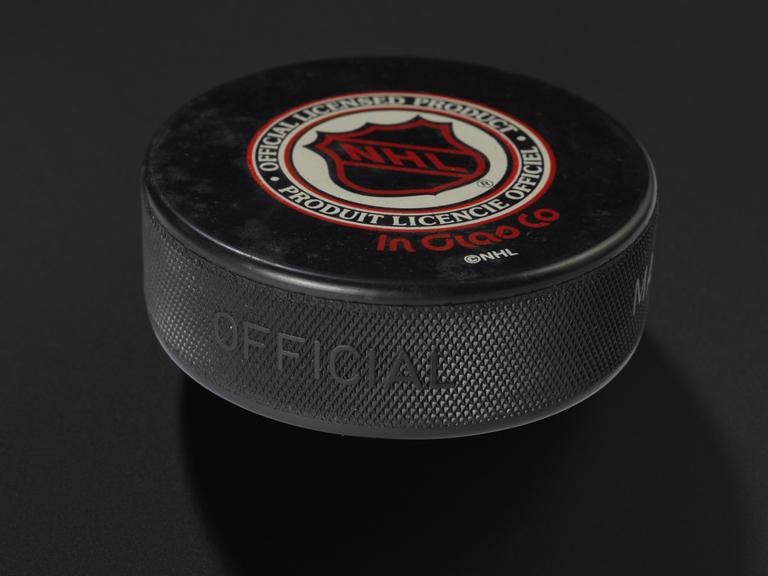 Hockey puck with Chicago Blackhawks emblem