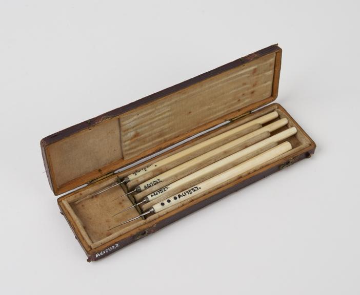 Four cataract needles, cased, possibly English, 19th century