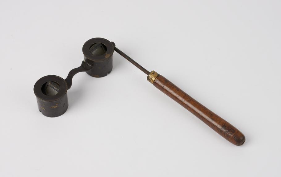 Optical instrument with wood handle