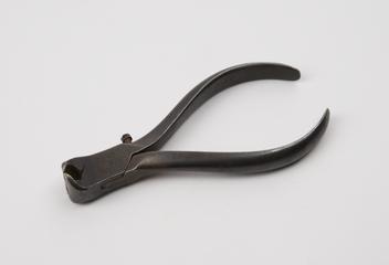 Pair of cast steel cutters used in the manufacture of spectacle frames