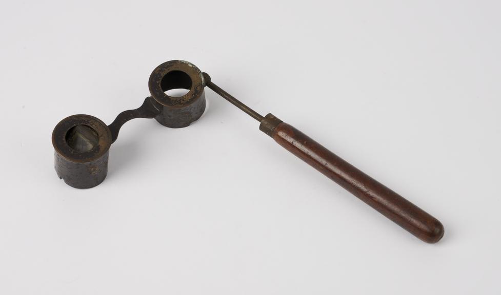 Optical instrument with wood handle