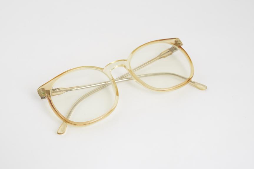 Pair of spectacles, pale brown/green frames