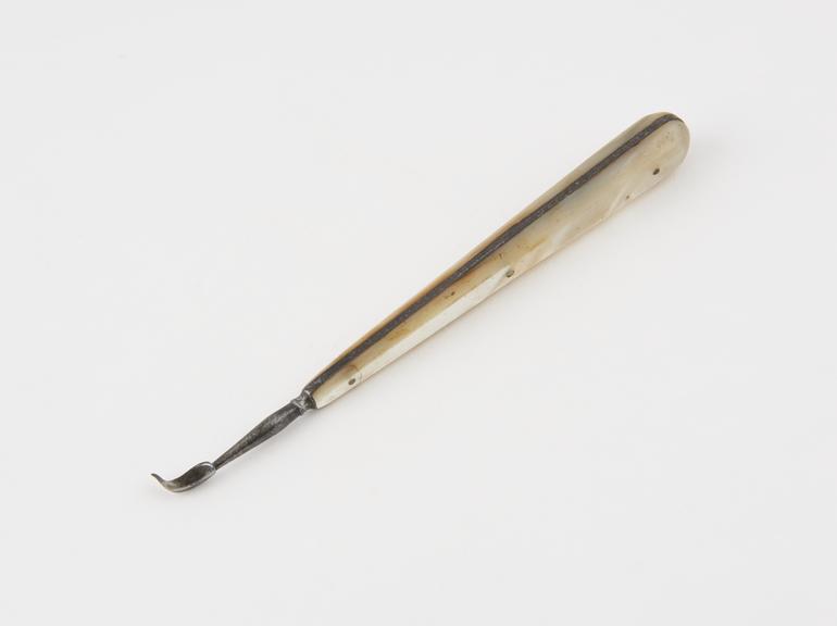 Dental descaler, steel with rivetted mother of pearl handle