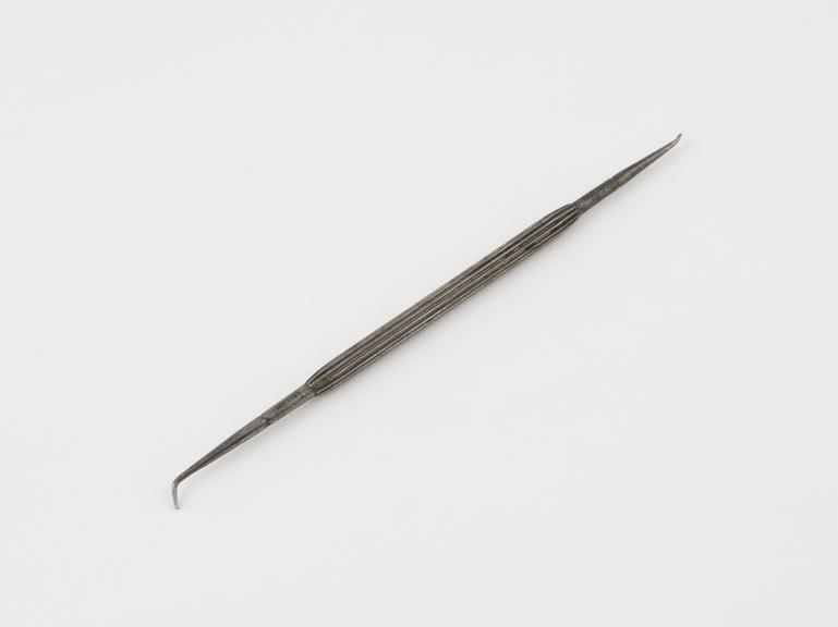 Dental stopper, double ended, steel with fluted handle