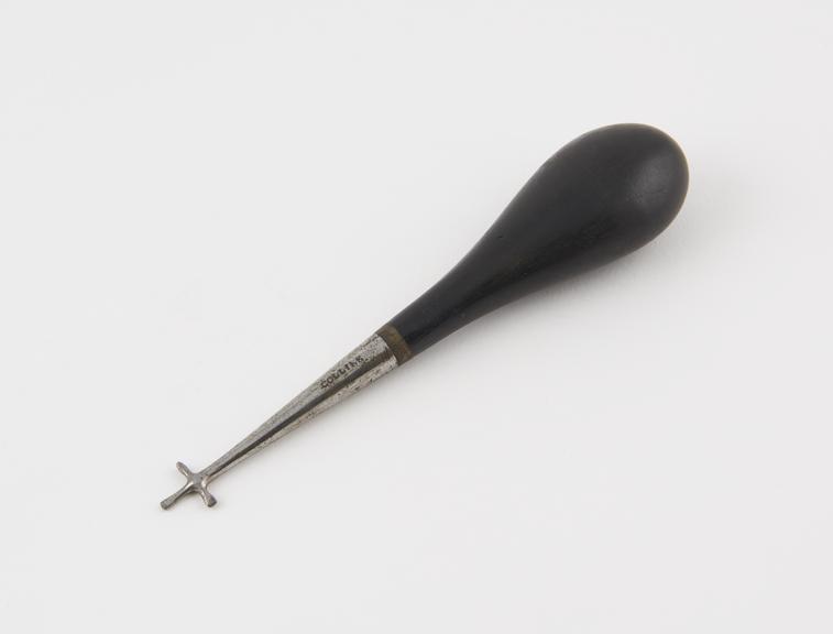 Dental stopper, steel with ebony handle, by Collins, England