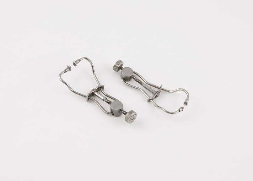 Two No.9 matrix retainers, stainless steel, by Ash, England