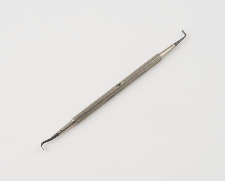 Dental plastics instrument, double ended, tantalum tipped