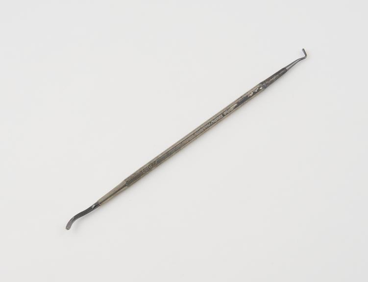 Dental plastics instrument, double ended, tantalum tipped