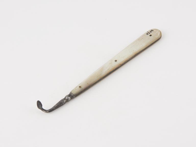 Dental descaler, steel with rivetted mother of pearl handle