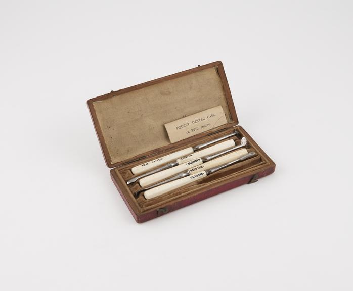 Dental descaler set, in rectangular tooled red leather covered