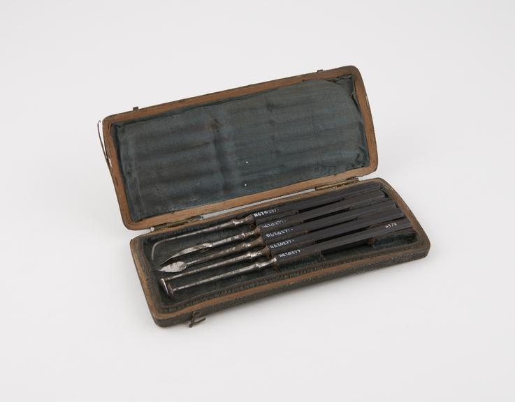 Dental descaler set, in rectangular sharkskin covered case