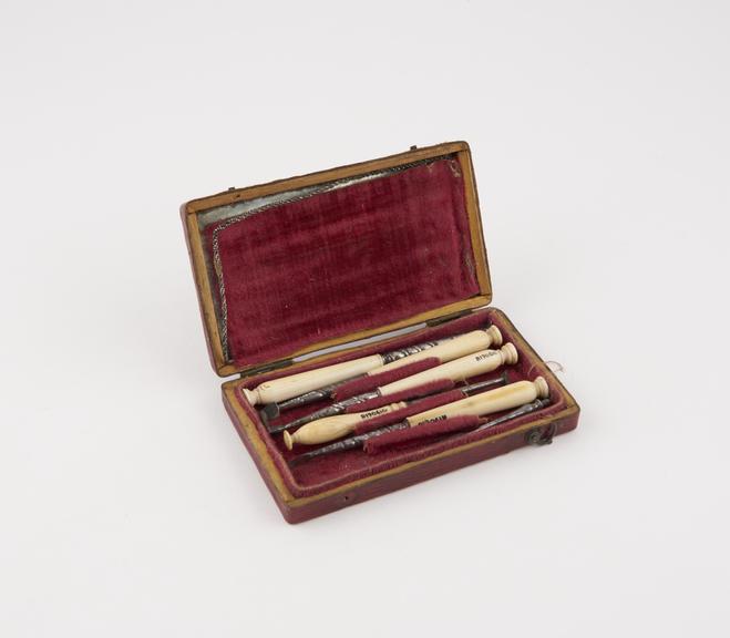 Personal dental descaler set, in tooled red leather covered