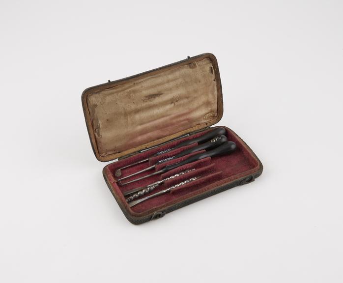 Dental descaler set, in rectangular sharkskin covered case