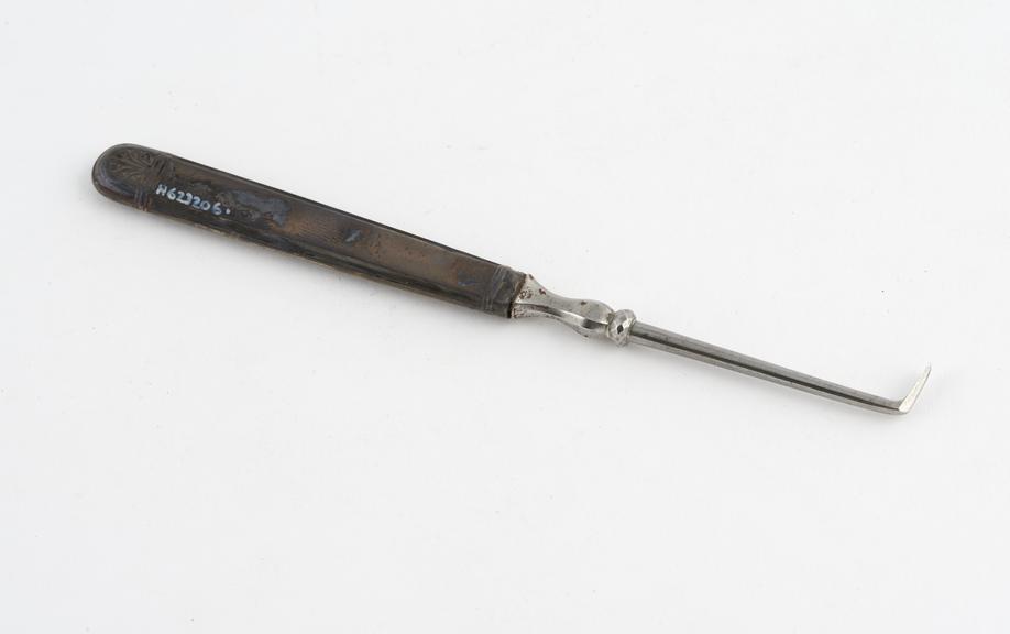 Dental descaler, steel with embossed silver handle