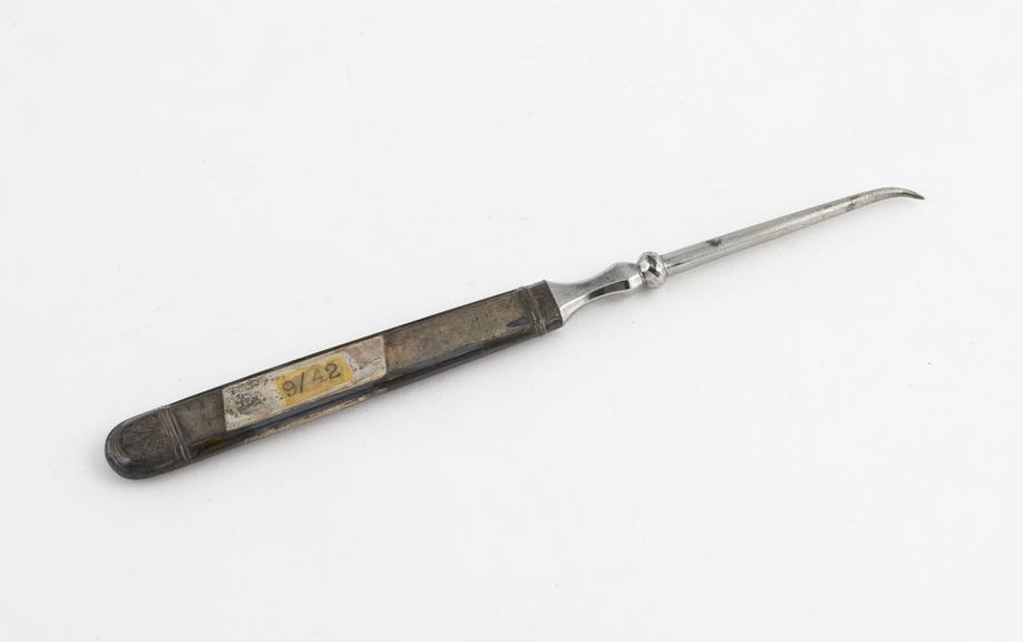 Dental descaler, steel with embossed silver handle