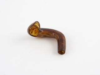 Part of earpiece of Imitation tortoiseshell ear trumpet