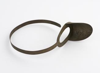 Metal headband associated with boxed parts of a conversation tube hearing aid