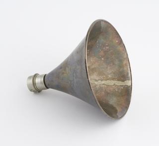 Funnel shaped silver bell, part of a conversation tube hearing aid