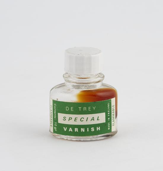 Bottle of de Trey's special varnish, glass