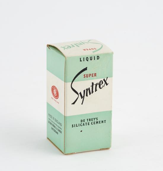 Boxed bottle of Syntrex' silicate cement liquid