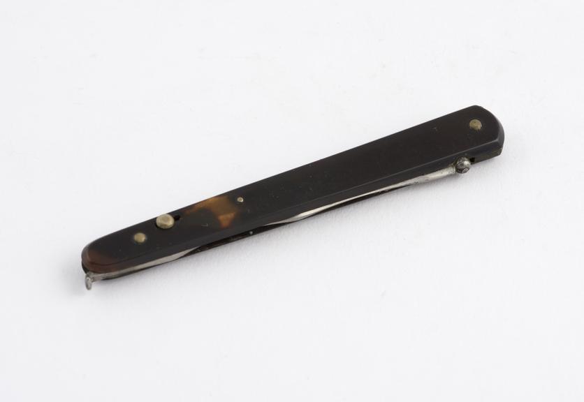 Gum lancet, folding, steel and tortoiseshell, by Luer of Paris