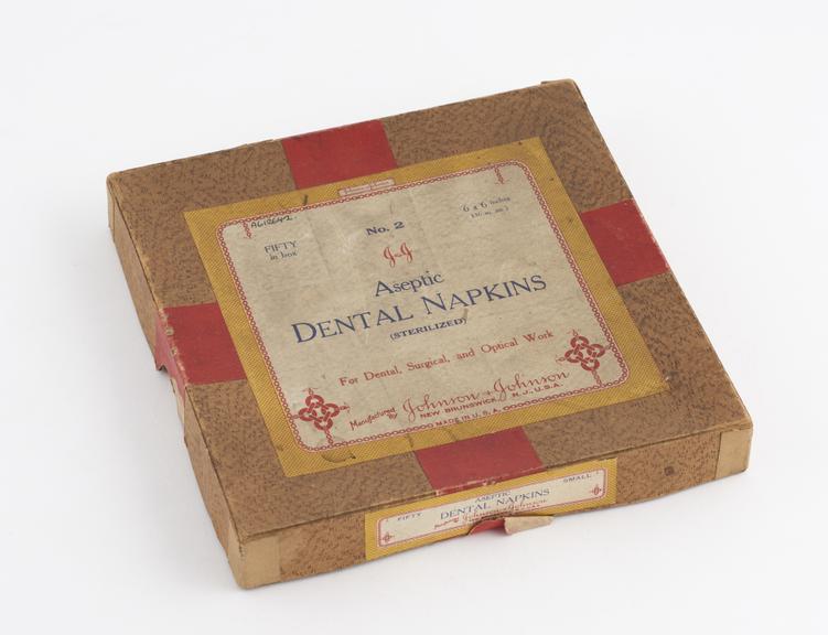 Linen dental napkins, in cardboard box, by Johnson and Johnson