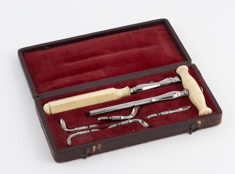 Dental elevator set, in red leather covered velvet lined case