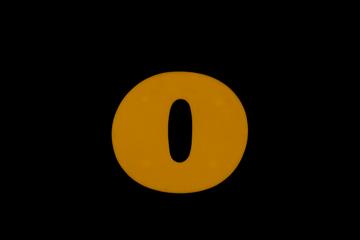 "o" from Band on the Wall music venue sign