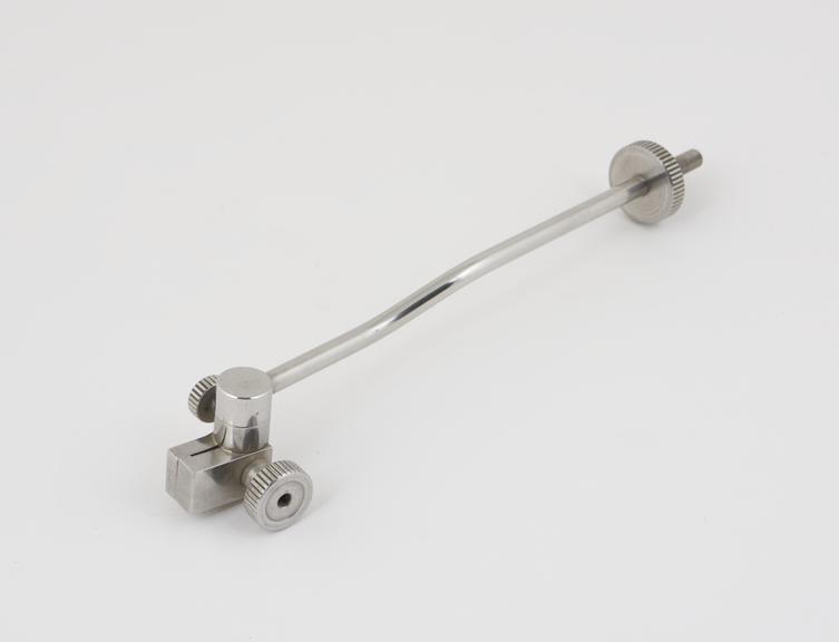 Metal component with screw thread at one end and a clamping