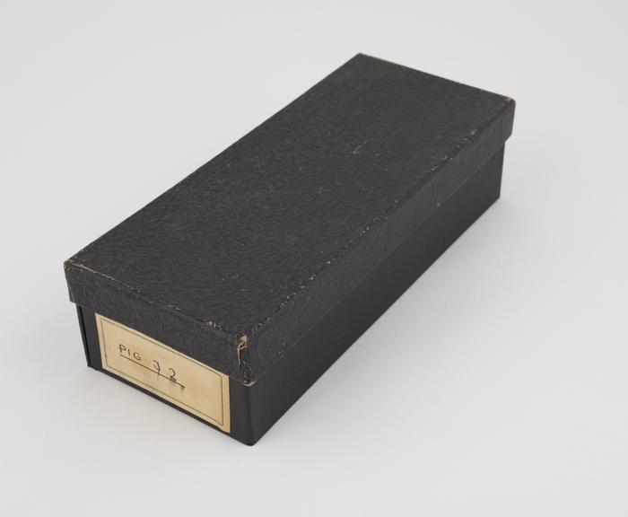 Black slide box, labelled Pig J2, used by H.W. Florey.