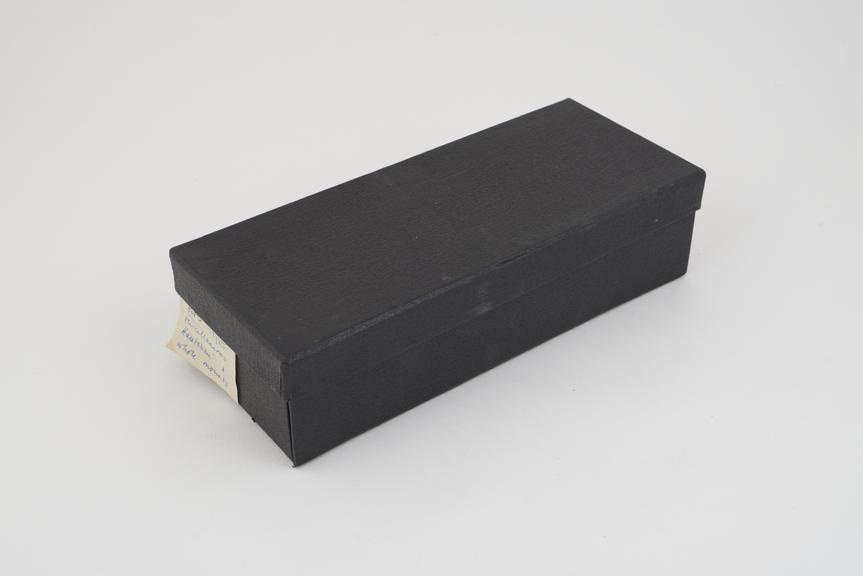 Collection of histological slide sections in black box