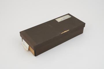 Collection of histological slide sections in black box