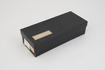 Collection of histological slide sections in black box