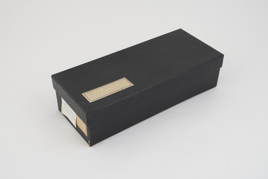 Collection of histological slide sections in black box